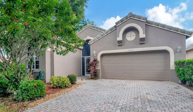 view of front of home with a garage