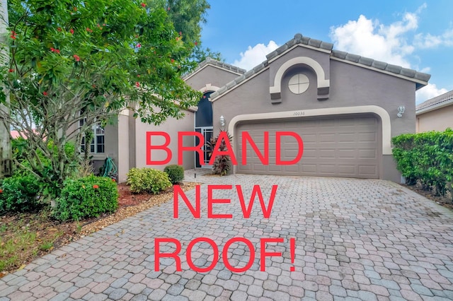 view of front of property with a garage