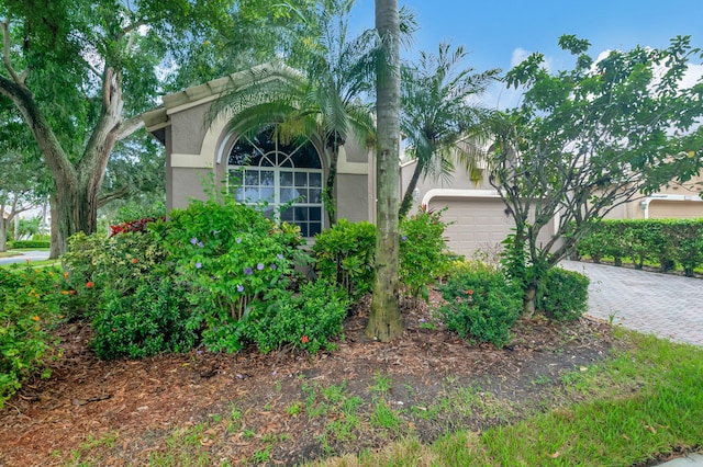 view of property exterior featuring a garage