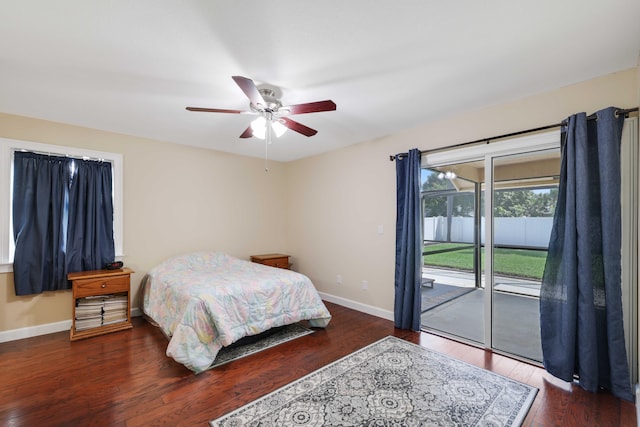 bedroom featuring access to outside, dark wood-type flooring, and ceiling fan