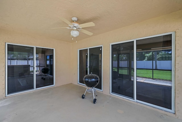 view of patio / terrace with ceiling fan