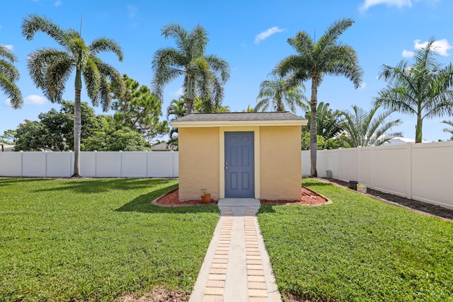 view of outdoor structure with a yard