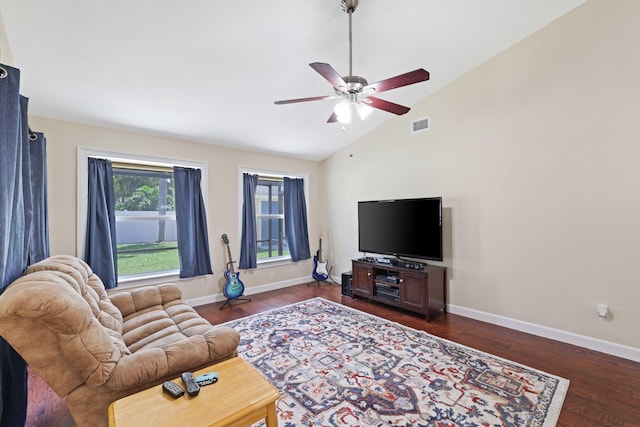 living room with high vaulted ceiling, ceiling fan, and dark wood-type flooring