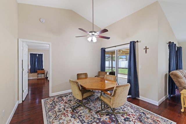 dining room featuring ceiling fan, dark wood-type flooring, and high vaulted ceiling