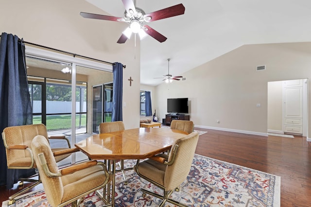 dining area with vaulted ceiling, dark hardwood / wood-style flooring, and ceiling fan