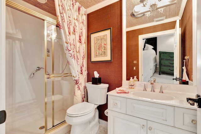 bathroom featuring vanity, toilet, an enclosed shower, and crown molding