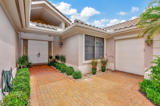 entrance to property with a garage