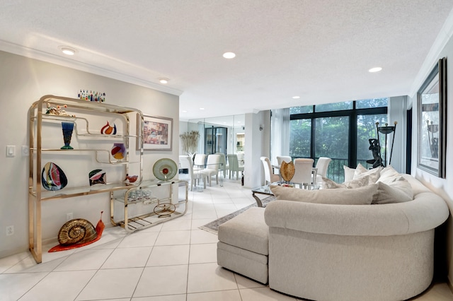 living room featuring floor to ceiling windows, a textured ceiling, light tile patterned floors, and crown molding