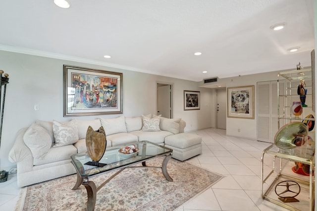 living room featuring light tile patterned flooring and ornamental molding