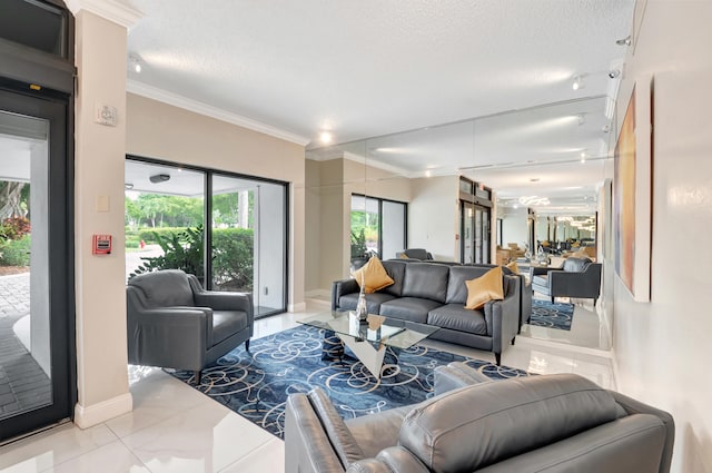 living room with a textured ceiling and crown molding