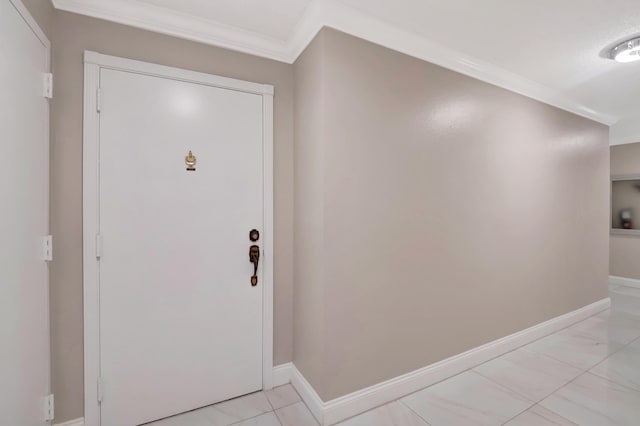 entrance foyer featuring crown molding