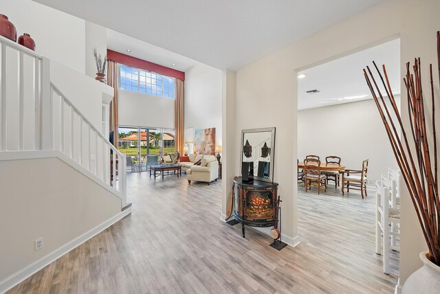 entryway with light hardwood / wood-style floors