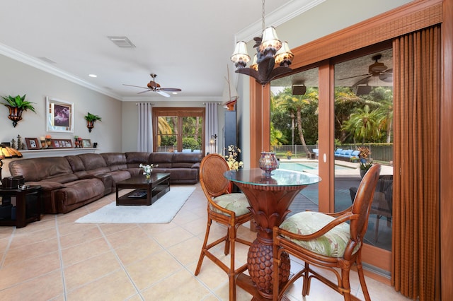 dining room featuring recessed lighting, visible vents, ornamental molding, light tile patterned flooring, and ceiling fan with notable chandelier