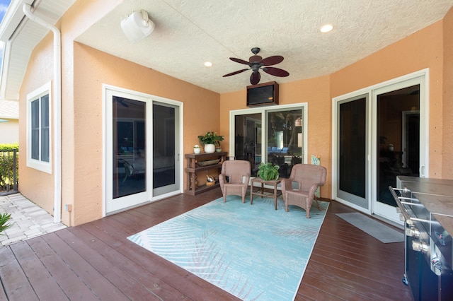 deck with a ceiling fan