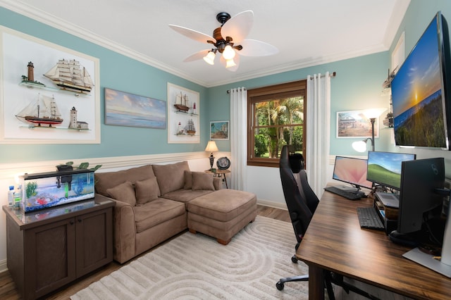 home office with crown molding, light wood finished floors, and ceiling fan