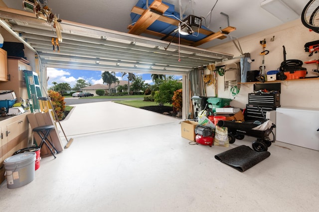 garage featuring a garage door opener