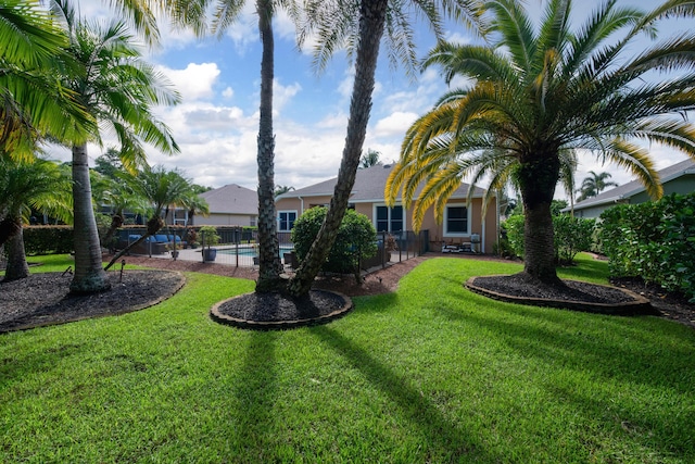 view of yard with an outdoor pool