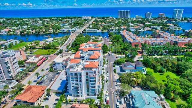 birds eye view of property featuring a water view