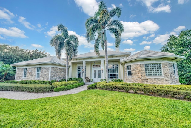 view of front of property with a front lawn