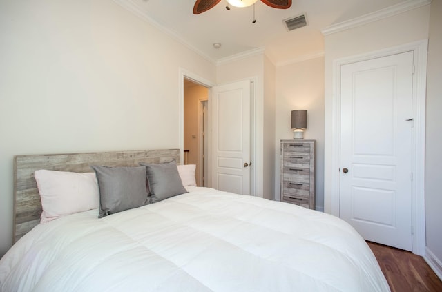 1970 S Dixie Hwy Unit R5, West Palm Beach, FL 33401 - bedroom with ornamental molding, a ceiling fan, dark wood-style floors, and visible vents