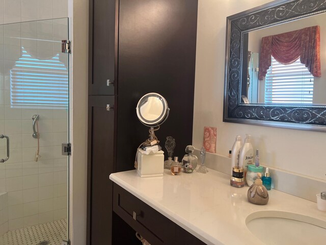 bathroom featuring vanity and walk in shower