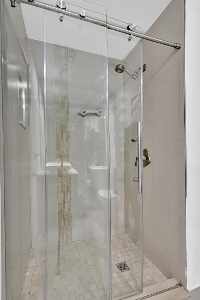 bathroom featuring walk in shower