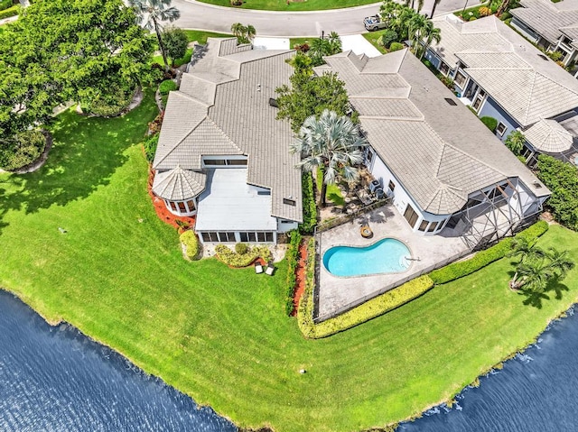 birds eye view of property featuring a water view