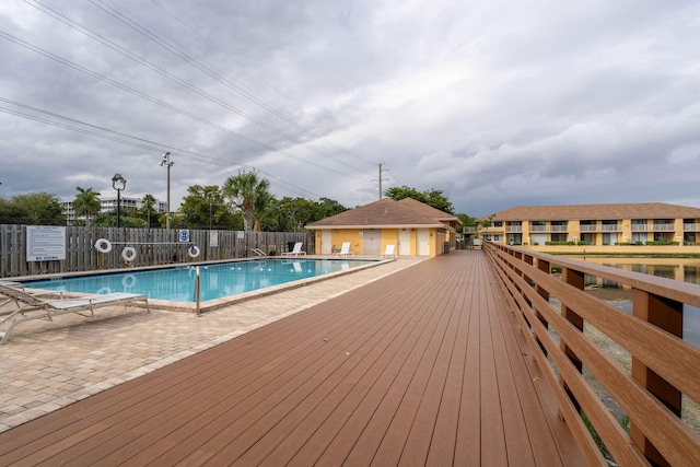 view of swimming pool with a patio area