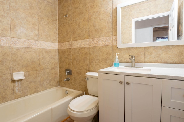 full bathroom with vanity, bathtub / shower combination, tile walls, toilet, and decorative backsplash