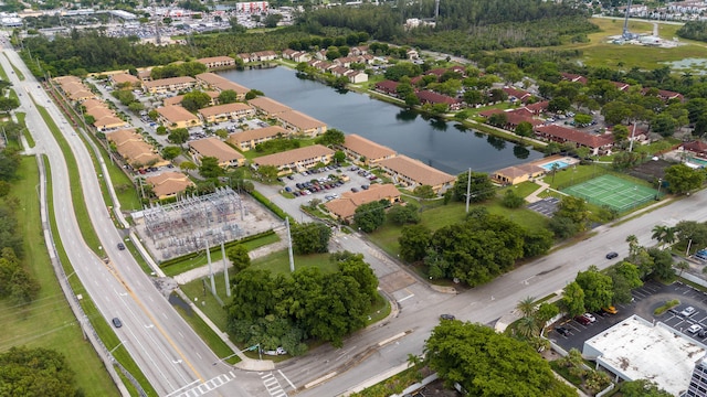 birds eye view of property featuring a water view