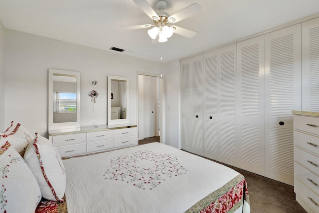 carpeted bedroom with ceiling fan