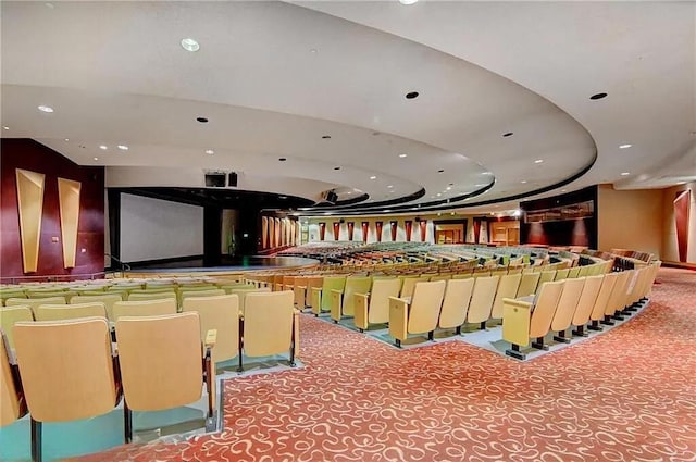 home theater room featuring recessed lighting and light carpet