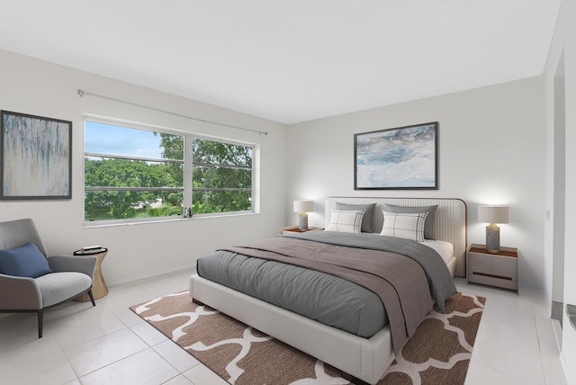 bedroom featuring light tile patterned floors