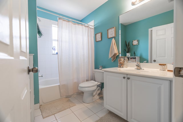 full bathroom featuring shower / tub combo, tile patterned flooring, vanity, and toilet