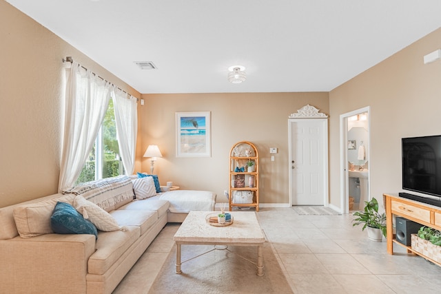 living room featuring light tile patterned floors