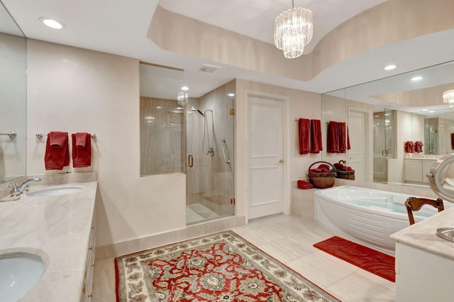 bathroom featuring an inviting chandelier, plus walk in shower, and vanity