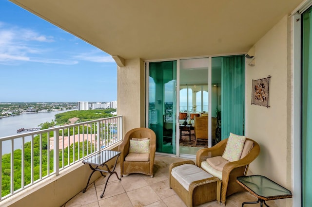 balcony featuring a water view