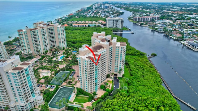 birds eye view of property featuring a water view