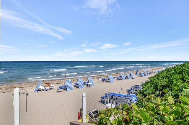 view of water feature with a beach view