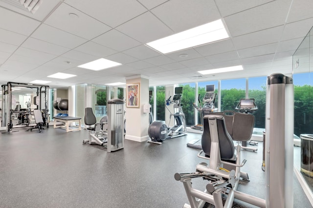 exercise room with a wall of windows and plenty of natural light