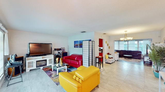 living room featuring a chandelier