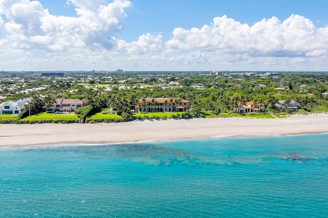 bird's eye view featuring a beach view and a water view