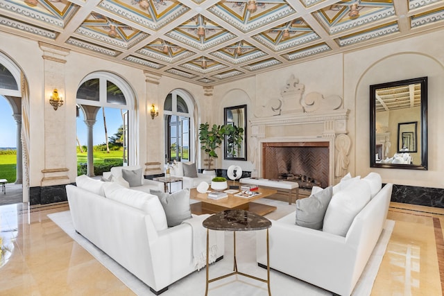 living room featuring crown molding and a fireplace