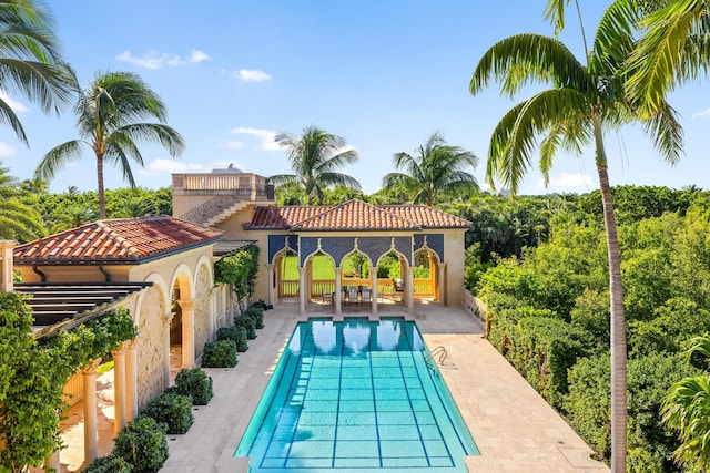 view of pool featuring a patio