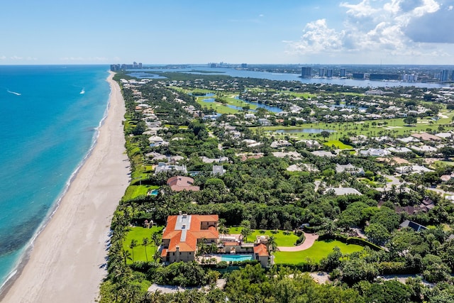 bird's eye view featuring a water view and a view of the beach