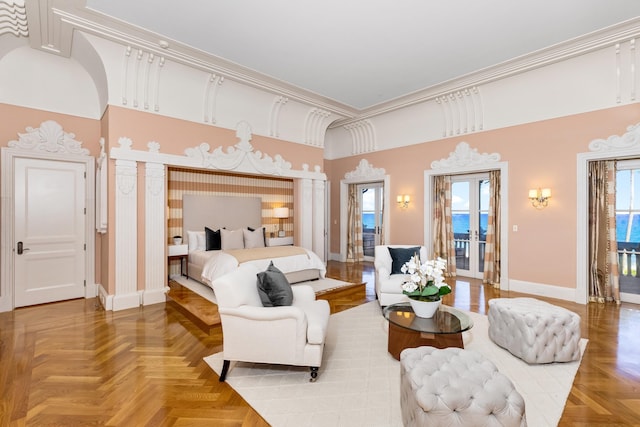 bedroom featuring multiple windows, crown molding, a high ceiling, and parquet flooring