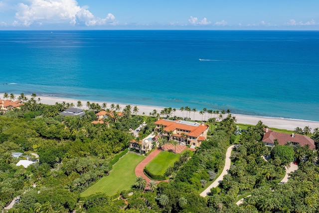 aerial view with a water view and a beach view