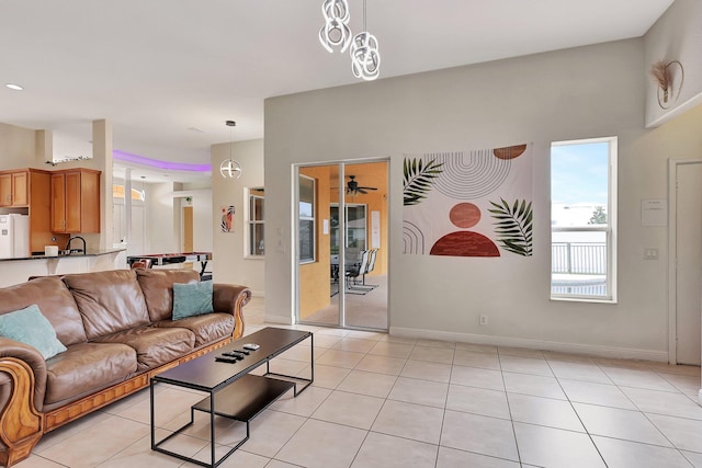 tiled living room featuring sink