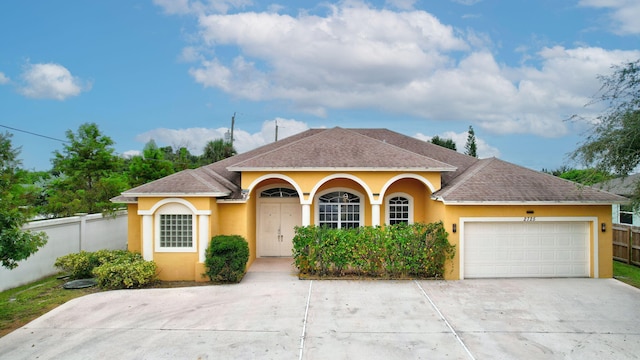 view of front of house with a garage