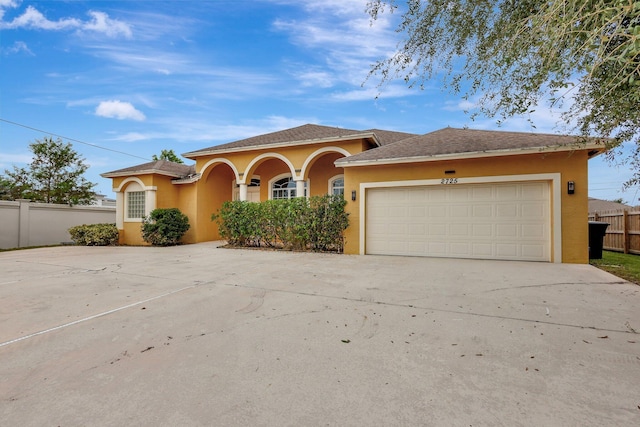 view of front of property featuring a garage